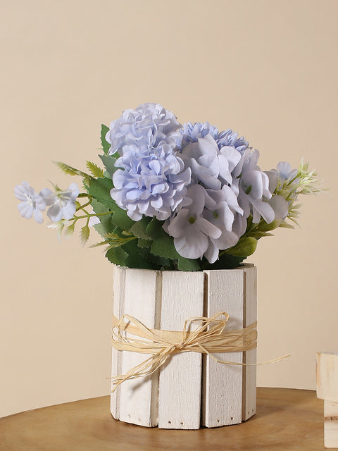 BLUE FAUX FLOWERS IN WOODEN CRATE POT