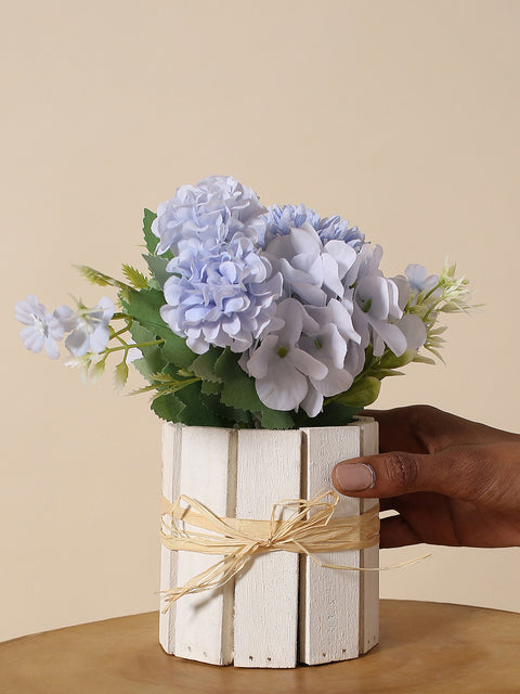 BLUE FAUX FLOWERS IN WOODEN CRATE POT